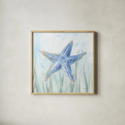 Undersea Starfish Seaweed by Danhui Nai. Shown in a natural wood glass frame for a timeless modern aesthetic. Available as an archival giclee rolled canvas, fine art paper, or poster print. SKU 84799a.