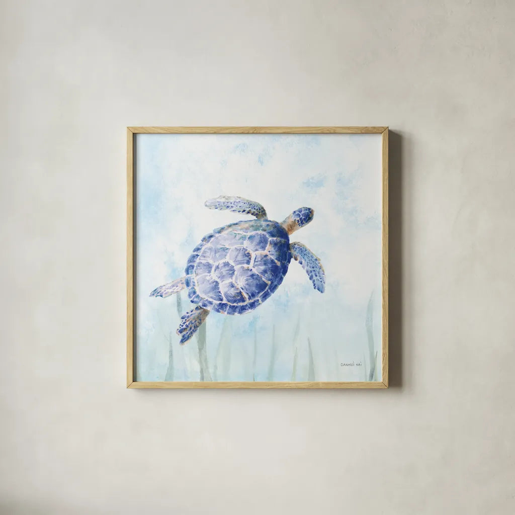 Undersea Turtle II by Danhui Nai. Shown in a natural wood glass frame for a timeless modern aesthetic. Available as an archival giclee rolled canvas, fine art paper, or poster print. SKU 83485a.