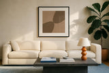 Unity Brown by Danhui Nai. Displayed in a glass frame with matte in a clean modern living room. Available as an archival giclee rolled canvas, fine art paper, or poster print. SKU 85454a.