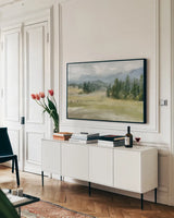 Valley Retreat by Danhui Nai. shown as a framed stretched canvas in a living room above a console. Available as a archival giclee rolled canvas, fine art paper, or poster print. SKU 90238i.