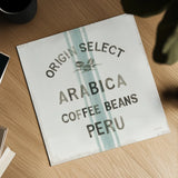 Wake Me Up Coffee Sack I by Danhui Nai. Shown as a detailed flat fine art print, highlighting archival giclee quality. Available as an archival giclee rolled canvas, fine art paper, or poster print. SKU 58859a.