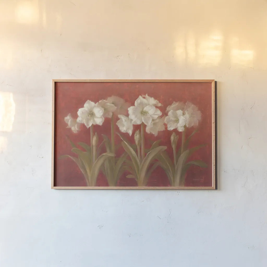 White Amaryllis on Red by Danhui Nai. shown as a paper print in a natural frame. Available as a archival giclee rolled canvas, fine art paper, or poster print. SKU 5244i.