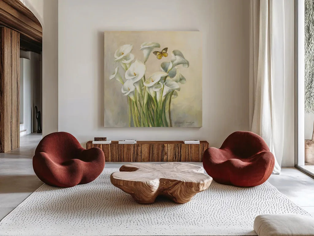 White Calla Lilies by Danhui Nai. Shown as extra-large giant wall art in a modern living room. Available as an archival giclee rolled canvas, fine art paper, or poster print. SKU 93198a.