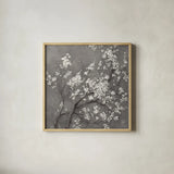 White Cherry Blossoms I on Grey Crop by Danhui Nai. Shown in a natural wood glass frame for a timeless modern aesthetic. Available as an archival giclee rolled canvas, fine art paper, or poster print. SKU 30776a.