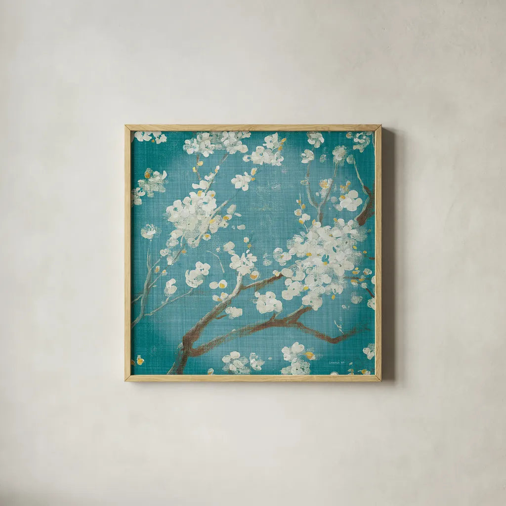White Cherry Blossoms I on Teal Aged no Bird by Danhui Nai. Shown in a natural wood glass frame for a timeless modern aesthetic. Available as an archival giclee rolled canvas, fine art paper, or poster print. SKU 31293a.