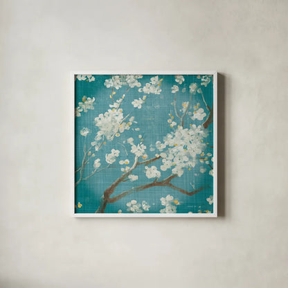 White Cherry Blossoms I on Teal Aged no Bird by Danhui Nai. Shown in a crisp white glass frame for a clean and minimalist style. Available as an archival giclee rolled canvas, fine art paper, or poster print. SKU 31293a.