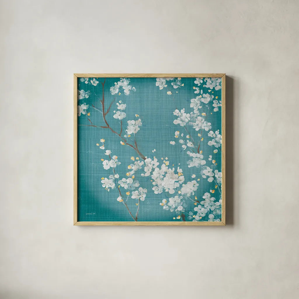 White Cherry Blossoms II on Teal Aged no Bird by Danhui Nai. Shown in a natural wood glass frame for a timeless modern aesthetic. Available as an archival giclee rolled canvas, fine art paper, or poster print. SKU 31294a.