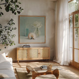 White Flower Spa by Danhui Nai. Shown in a natural wood frame in a cozy modern living room. Available as an archival giclee rolled canvas, fine art paper, or poster print. SKU 5599a.