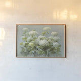 White Hydrangea Garden by Danhui Nai. shown as a paper print in a natural frame. Available as a archival giclee rolled canvas, fine art paper, or poster print. SKU 9375i.