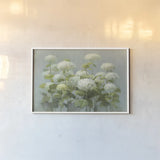 White Hydrangea Garden by Danhui Nai. shown as a paper print in a white frame. Available as a archival giclee rolled canvas, fine art paper, or poster print. SKU 9375i.