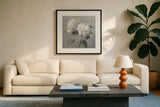 White Hydrangeas by Danhui Nai. Displayed in a glass frame with matte in a clean modern living room. Available as an archival giclee rolled canvas, fine art paper, or poster print. SKU 91400a.