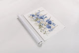 Wildflowers in Bloom I Blue by Danhui Nai. shown as a rolled paper print. Available as archival giclee rolled canvas, fine art paper, or poster print. SKU 74499i.