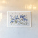 Wildflowers in Bloom I Blue by Danhui Nai. shown as a paper print in a white frame. Available as a archival giclee rolled canvas, fine art paper, or poster print. SKU 74499i.