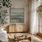 Winged Sanctuary by Danhui Nai. Shown in a natural wood frame in a cozy modern living room. Available as an archival giclee rolled canvas, fine art paper, or poster print. SKU 81741a.