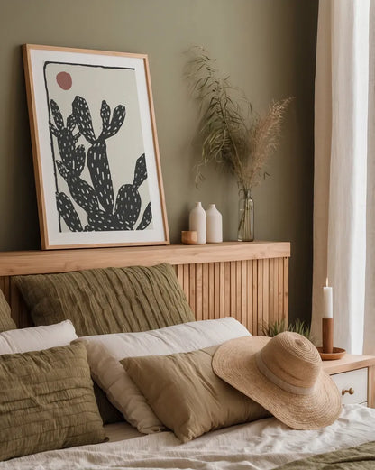 Woodcut Cactus I by Danhui Nai. shown as a paper print in a natural frame. Available as a archival giclee rolled canvas, fine art paper, or poster print. SKU 95297h.