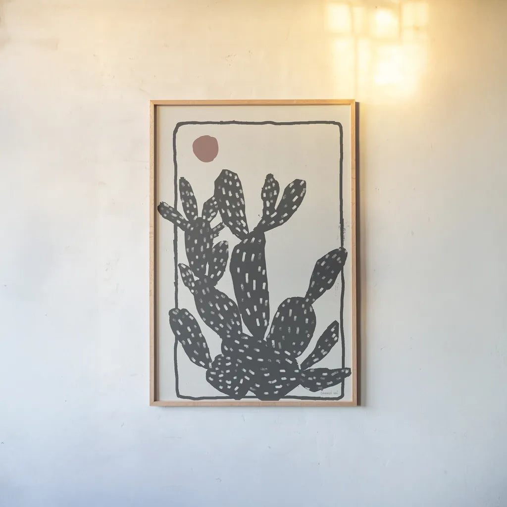 Woodcut Cactus I by Danhui Nai. shown as a paper print in a natural frame. Available as a archival giclee rolled canvas, fine art paper, or poster print. SKU 95297h.