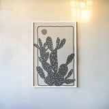 Woodcut Cactus I by Danhui Nai. shown as a paper print in a white frame. Available as a archival giclee rolled canvas, fine art paper, or poster print. SKU 95297h.