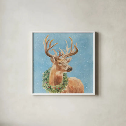 Woodland Holidays Stag Blue by Danhui Nai. Shown in a crisp white glass frame for a clean and minimalist style. Available as an archival giclee rolled canvas, fine art paper, or poster print. SKU 58282a.