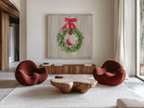 Woodland Holidays Wreath by Danhui Nai. Shown as extra-large giant wall art in a modern living room. Available as an archival giclee rolled canvas, fine art paper, or poster print. SKU 38764a.