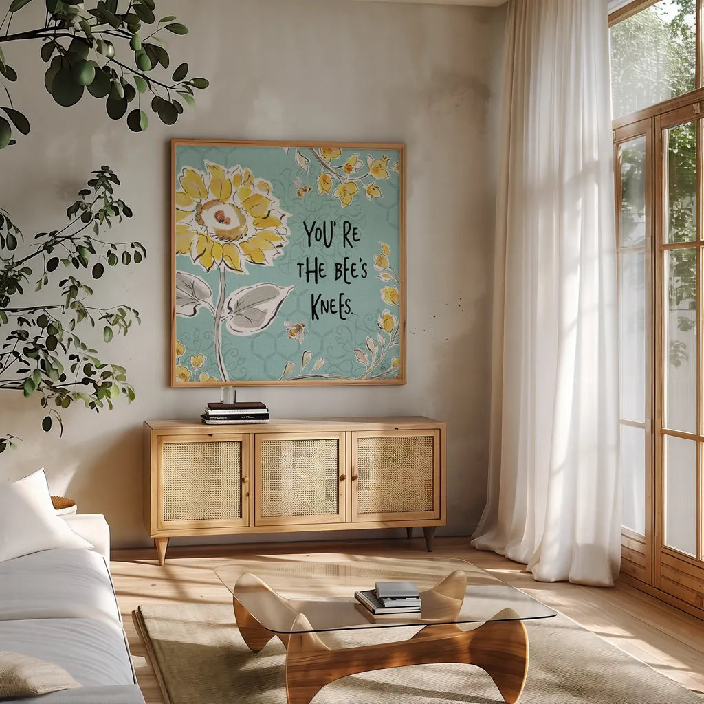 Bee Happy II Linen by Daphne Brissonnet. Shown in a natural wood frame in a cozy modern living room. Available as an archival giclee rolled canvas, fine art paper, or poster print. SKU 44550a.