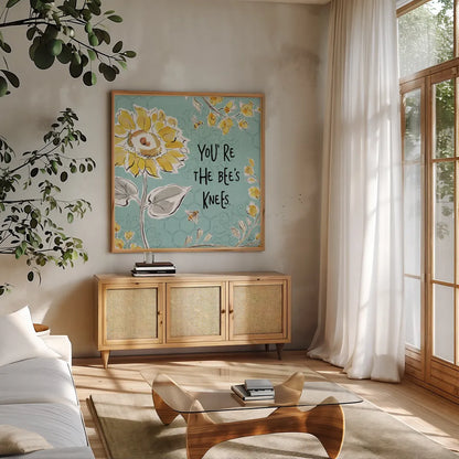 Bee Happy II Linen by Daphne Brissonnet. Shown in a natural wood frame in a cozy modern living room. Available as an archival giclee rolled canvas, fine art paper, or poster print. SKU 44550a.
