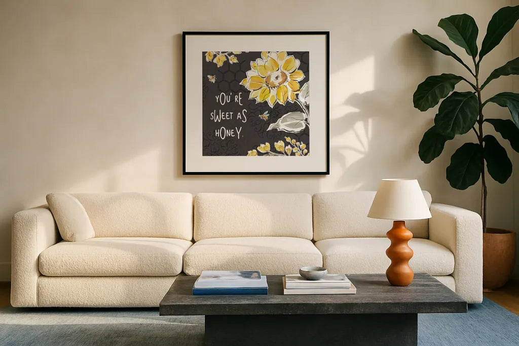 Bee Happy III Black by Daphne Brissonnet. Displayed in a glass frame with matte in a clean modern living room. Available as an archival giclee rolled canvas, fine art paper, or poster print. SKU 44552a.