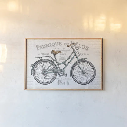 Bicycles I by Daphne Brissonnet. shown as a paper print in a natural frame. Available as a archival giclee rolled canvas, fine art paper, or poster print. SKU 28773i.