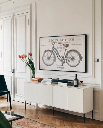 Bicycles II by Daphne Brissonnet. shown as a framed stretched canvas in a living room above a console. Available as a archival giclee rolled canvas, fine art paper, or poster print. SKU 28774i.