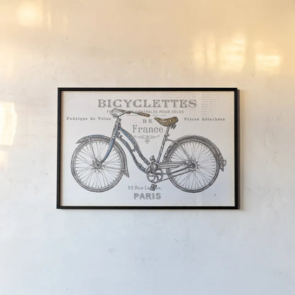 Bicycles II by Daphne Brissonnet. shown as a paper print in a black flame. Available as a archival giclee rolled canvas, fine art paper, or poster print. SKU 28774i.