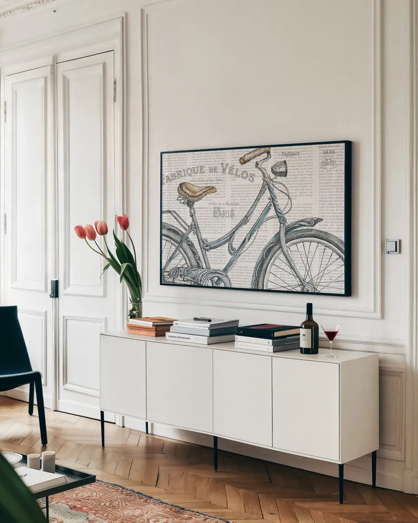 Bicycles III by Daphne Brissonnet. shown as a framed stretched canvas in a living room above a console. Available as a archival giclee rolled canvas, fine art paper, or poster print. SKU 28775i.