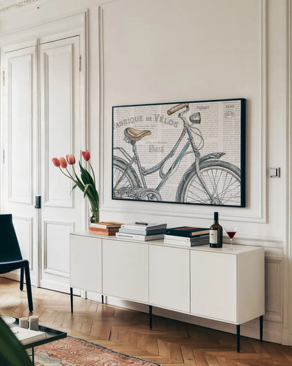 Bicycles III by Daphne Brissonnet. shown as a framed stretched canvas in a living room above a console. Available as a archival giclee rolled canvas, fine art paper, or poster print. SKU 28775i.