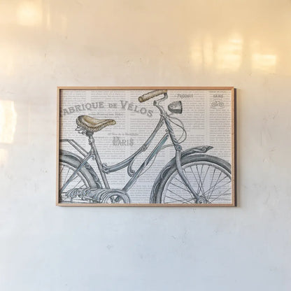 Bicycles III by Daphne Brissonnet. shown as a paper print in a natural frame. Available as a archival giclee rolled canvas, fine art paper, or poster print. SKU 28775i.