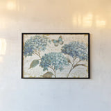 Blue Garden I by Daphne Brissonnet. shown as a paper print in a black flame. Available as a archival giclee rolled canvas, fine art paper, or poster print. SKU 25359i.