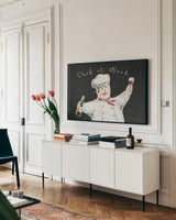 Chef at Work I by Daphne Brissonnet. shown as a framed stretched canvas in a living room above a console. Available as a archival giclee rolled canvas, fine art paper, or poster print. SKU 52667i.