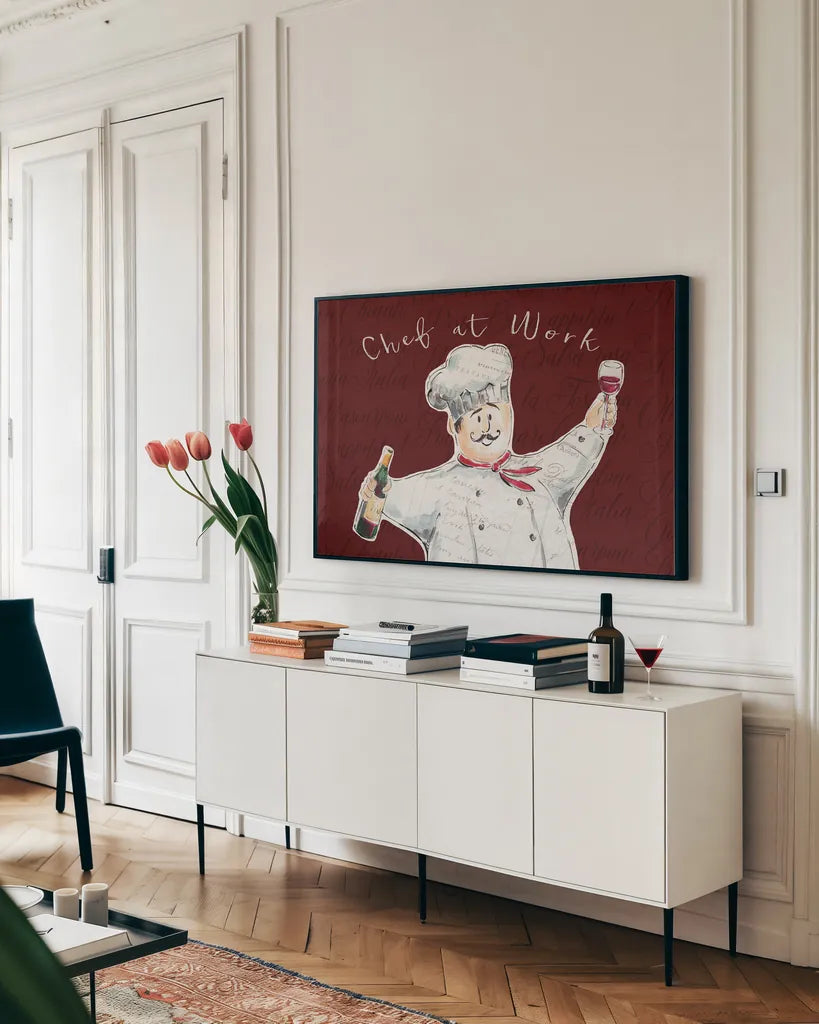 Chef at Work II by Daphne Brissonnet. shown as a framed stretched canvas in a living room above a console. Available as a archival giclee rolled canvas, fine art paper, or poster print. SKU 52668i.