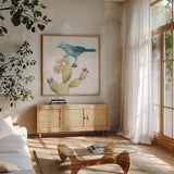 Desert Beauties XI by Daphne Brissonnet. Shown in a natural wood frame in a cozy modern living room. Available as an archival giclee rolled canvas, fine art paper, or poster print. SKU 65781a.