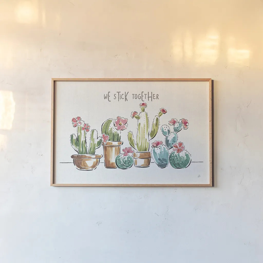 Desert Bloom I by Daphne Brissonnet. shown as a paper print in a natural frame. Available as a archival giclee rolled canvas, fine art paper, or poster print. SKU 35017i.