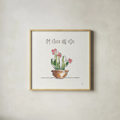 Desert Bloom II by Daphne Brissonnet. Shown in a natural wood glass frame for a timeless modern aesthetic. Available as an archival giclee rolled canvas, fine art paper, or poster print. SKU 35018a.