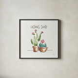 Desert Bloom III by Daphne Brissonnet. Shown in a sleek black glass frame for a contemporary gallery look. Available as an archival giclee rolled canvas, fine art paper, or poster print. SKU 35019a.