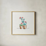 Desert Bloom V by Daphne Brissonnet. Shown in a natural wood glass frame for a timeless modern aesthetic. Available as an archival giclee rolled canvas, fine art paper, or poster print. SKU 35021a.