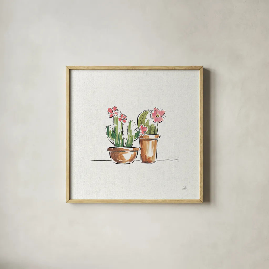 Desert Bloom VI by Daphne Brissonnet. Shown in a natural wood glass frame for a timeless modern aesthetic. Available as an archival giclee rolled canvas, fine art paper, or poster print. SKU 35022a.