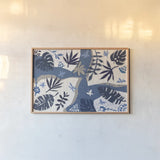 Desert Flair II by Daphne Brissonnet. shown as a paper print in a natural frame. Available as a archival giclee rolled canvas, fine art paper, or poster print. SKU 62045i.