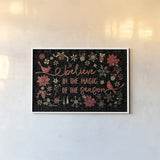 Holiday Impressions II Black by Daphne Brissonnet. shown as a paper print in a white frame. Available as a archival giclee rolled canvas, fine art paper, or poster print. SKU 32394i.