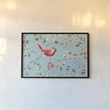 Holiday Wings I Blue by Daphne Brissonnet. shown as a paper print in a black flame. Available as a archival giclee rolled canvas, fine art paper, or poster print. SKU 36747i.