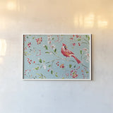 Holiday Wings II Blue by Daphne Brissonnet. shown as a paper print in a white frame. Available as a archival giclee rolled canvas, fine art paper, or poster print. SKU 36748i.