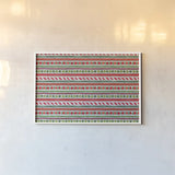 Holiday Wings IX by Daphne Brissonnet. shown as a paper print in a white frame. Available as a archival giclee rolled canvas, fine art paper, or poster print. SKU 36745i.