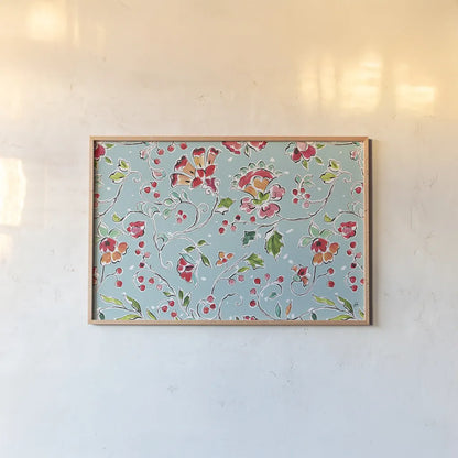 Holiday Wings VIII Blue by Daphne Brissonnet. shown as a paper print in a natural frame. Available as a archival giclee rolled canvas, fine art paper, or poster print. SKU 36754i.