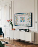 Mediterranean Breeze III by Daphne Brissonnet. shown as a framed stretched canvas in a living room above a console. Available as a archival giclee rolled canvas, fine art paper, or poster print. SKU 45719i.