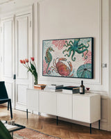 Ocean Finds I by Daphne Brissonnet. shown as a framed stretched canvas in a living room above a console. Available as a archival giclee rolled canvas, fine art paper, or poster print. SKU 64725i.