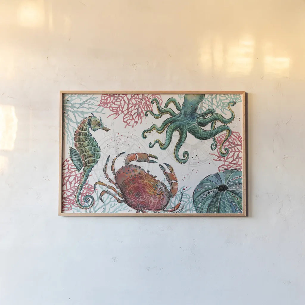 Ocean Finds I by Daphne Brissonnet. shown as a paper print in a natural frame. Available as a archival giclee rolled canvas, fine art paper, or poster print. SKU 64725i.